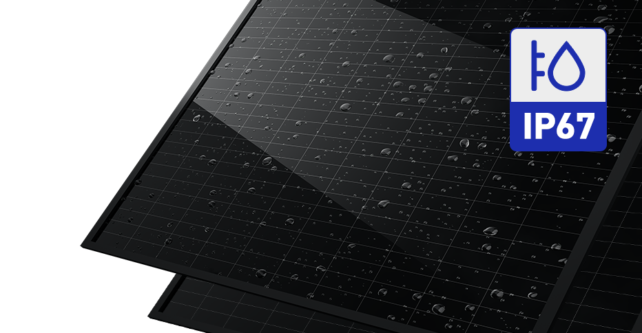 A close-up image of a solar panel with water droplets on it